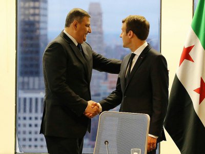Rencontre entre le président français Emmanuel Macron et le coordinateur du Haut comité syrien pour les négociations, Riyad Hijab, au siège de l'ONU à New York, le 18 septembre 2017 - LUDOVIC MARIN [AFP]