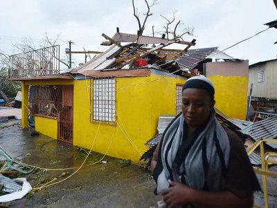 Residents of San Juan deal with damage to their homes - HECTOR RETAMAL [AFP]