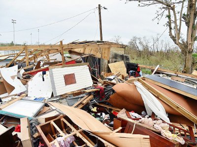 Des maisons détruites à Catano, sur l'île de Porto Rico, le 21 septembre 2017 après le passage de l'ouragan Maria - HECTOR RETAMAL [AFP]