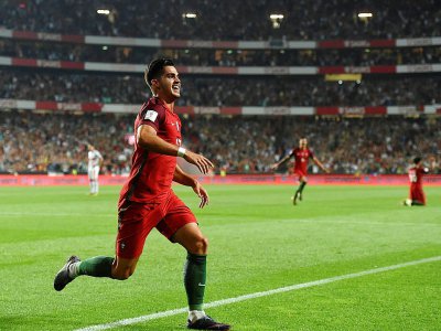 L'attaquant Andre Silva affiche sa joie après avoir assuré le but du break du Portugal contre la Suisse à Lisbonne, le 10 octobre 2017 - FRANCISCO LEONG [AFP]