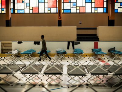Une patinoire à Cergy dans la banlieue parisienne, transformée en centre d'admission pour migrants, le 12 octobre 2017 - Lionel BONAVENTURE [AFP/Archives]