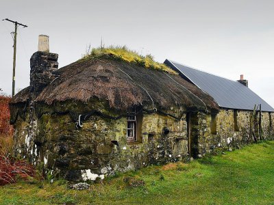Un cottage de l'île d'Ulva, le 20 octobre 2017 en Ecosse - ANDY BUCHANAN [AFP]