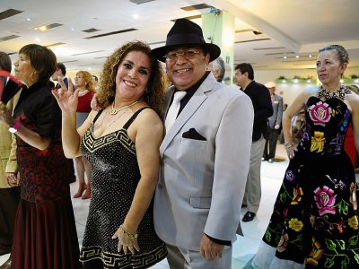 Couple amateur de "danzon" au club "Sociales Romo" à Mexico le 10 septembre 2017 - ALFREDO ESTRELLA [AFP/Archives]