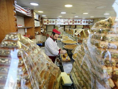 La pâtisserie de Mazen Obeido, réfugié syrien, le 28 octobre 2017 )à Irbid (nord de la Jordanie) - KHALIL MAZRAAWI [AFP]