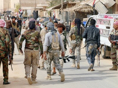 Des forces progouvernementales irakiennes se préparent à d'autres opérations après avoir pris la localité de Rawa au groupe Etat islamique (EI), le 18 novembre 2017 - Suleiman al-ANBARI [AFP]