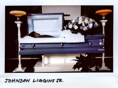 Johnson "John John" Liggins Jr., 17 ans, repose au funérarium de Chicago en novembre 2017 - JIM YOUNG [AFP]