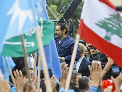 Le Premier ministre libanais Saad Hariri au milieu de ses partisans après son retour à Beyrouth, le 22 novembre 2017 - MARWAN TAHTAH [AFP/Archives]