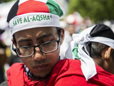 Des Indonésiens manifestent contre la reconnaissance par Donald Trump de Jérusalem comme capitale d'Israël à Jakarta, le 10 décembre 2017 - DONAL HUSNI, DONAL HUSNI [AFP]