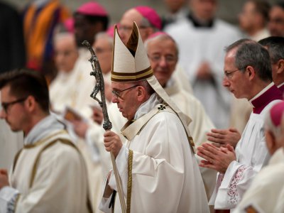 Le pape François célèbre la messe de la veillée de Noël, le 24 décembre 2017 au Vatican - Andreas SOLARO [AFP]