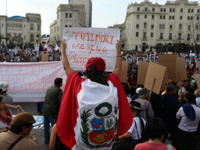 Des Péruviens manifestent contre la grâce accordée par le président Pedro Pablo Kuczynski à l'ex-président Alberto Fujimori, le 25 décembre 2017 à Lima - Juan Vita [AFP]