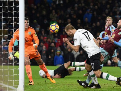 Le défenseur estonien de Liverpool Ragnar Klavan marque un but à Burnley en 22e journée de Premier League le 1er janvier 2018 - Oli SCARFF [AFP]