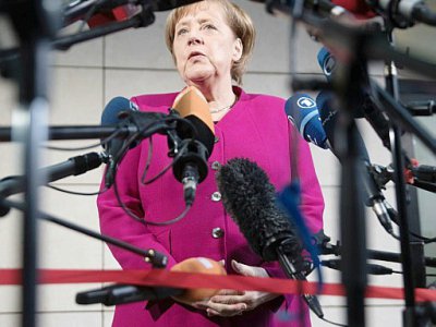 La chancelière allemande Angela Merkel s'exprime devant la presse avant une réunion politique le 7 janvier 2018, à Berlin - Jörg Carstensen [DPA/AFP]