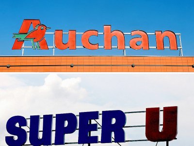 Photos des logos d'Auchan et Super U, le 15 mai 2015 - REMY GABALDA, MYCHELE DANIAU [AFP/Archives]