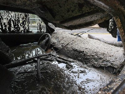 Les coulées de boue ont tout dévasté sur leur passage, comme cette automobile le 9 janvier 2018 en Californie - Robyn Beck [AFP]