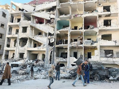 Bâtiments dévastés après l'explosion d'origine indéterminée près du quartier général de combattants jihadistes asiatiques à Idleb, le 8 janvier 2018 - OMAR HAJ KADOUR [AFP]