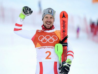 L'Autrichien Marcel Hirscher célèbre sa victoire sur le combiné, à Pyeongchang, le 13 février 2018 - Martin BERNETTI [AFP]