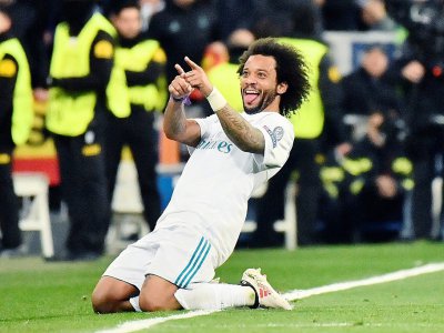 Le défenseur brésilien du Real Madrid Marcelo fête un but contre le PSG, le 14 février 2018 au stade Santiago Bernabeu - CHRISTOPHE SIMON [AFP]