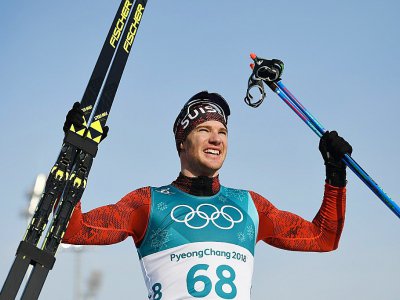 Le Suisse Dario Cologna savoure sa victoire sur le 15 km libre de ski de fond aux JO, le 16 février 2018 à Pyeongchang - FRANCK FIFE [AFP]
