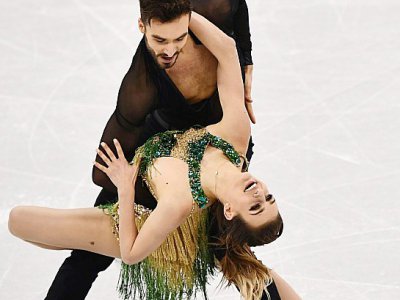 Gabriella Papadakis et Guillaume Cizeron lors du programme court de danse sur glace à Gangneung, le 19 février 2018 - ARIS MESSINIS [AFP]