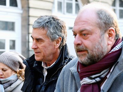 L'ancien ministre du Budget Jérôme Cahuzac (centre) et son avocat Eric Dupond-Moretti (droite) à leur arrivée au palais de Justice de Paris le 21 février 2018 - Eric FEFERBERG [AFP]