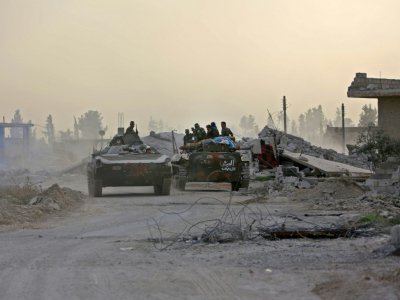 Des chars des forces armées syriennes lors de leur avancée dans la Ghouta orientale, le 4 mars 2018 - STRINGER [AFP]