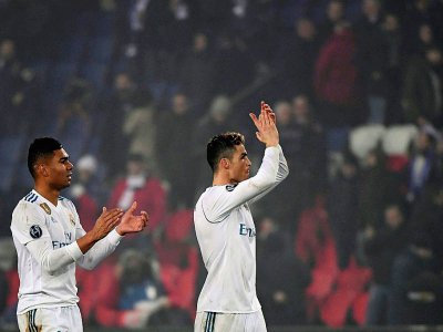 Cristiano Ronaldo (d) et Casemiro lors de la victoire du Real face au PSG le 6 mars 2018 en Ligue des champions - PIERRE-PHILIPPE MARCOU [AFP]