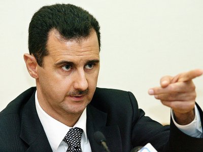 Le président syrien Bashar Al-Assad lors d'une conférence de presse à Moscou le 19 décembre 2006 - YURI KADOBNOV [AFP/Archives]