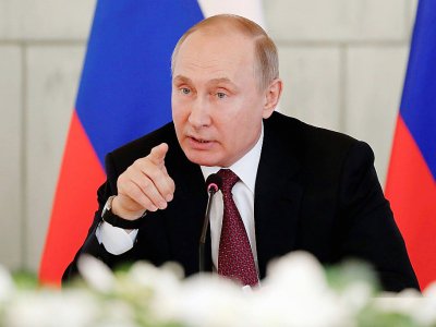 Le président russe Vladimir Poutine, le 16 mars 2018 à Saint-Pétersbourg - Anatoly Maltsev [POOL/AFP]