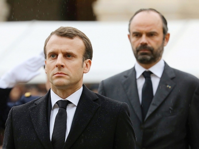 Emmanuel Macron et le premier ministre Edouard Philippe lors des cérémonies nationales en hommage au colonel Arnaud Beltrame, le 28 mars 2018 à Paris - ludovic MARIN [POOL/AFP/Archives]