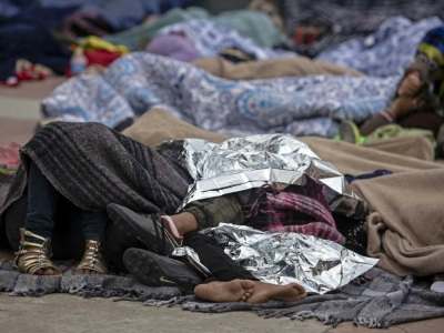 Quelque 150 Centre-américains attendent le 30 avril 2018 dans un campement improvisé à Tijuana, au Mexique - GUILLERMO ARIAS [AFP]