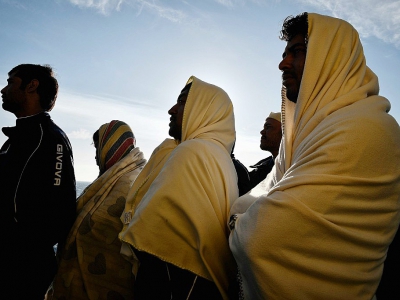 Des migrants face à la côte sicilienne la 10 mai 2018 - LOUISA GOULIAMAKI [AFP]