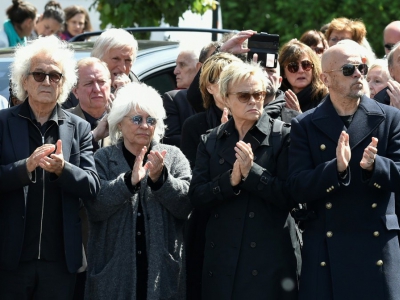 De gauche à droite: le compositeur Luc Plamondon, la chanteuse Catherine Lara, l'humoriste Muriel Robin et le chanteur Pascal Obispo aux funérailles de Maurane, le 17 mai 2018 à Bruxelles - JOHN THYS [AFP]