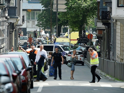 Des policiers et des ambulances sur les lieux de la fusillade à Liège, le 29 mai 2018 - JOHN THYS [AFP]