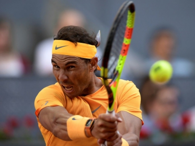 Rafael Nadal contre Dominic Thiem en quart de finale du tournoi de Madrid le 11 mai 2018 - OSCAR DEL POZO [AFP]