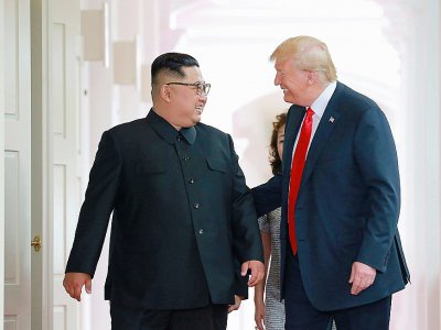 Le dirigeant nord-coréen Kim Jong Un et le président américain Donald Trump, le 12 juin 2018 à Singapour - - [KCNA VIA KNS/AFP]