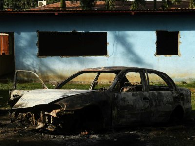 Un commissariat de police incendié par les manifestants à Diriamba, à 40 km de Managua, le 14 juin 2018. - MARVIN RECINOS [AFP]