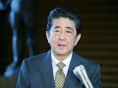 Le premier ministre japonais Shinzo Abe lors d'une conférence de presse à Tokyo, le 18 juin 2018 - STR [JIJI PRESS/AFP]