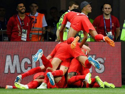 Les joueurs anglais exultent sur le 2e but d'Harry kane face à la Tunisie lors du Mondial, le 18 juin 2018 à Volgograd - Mark RALSTON [AFP]