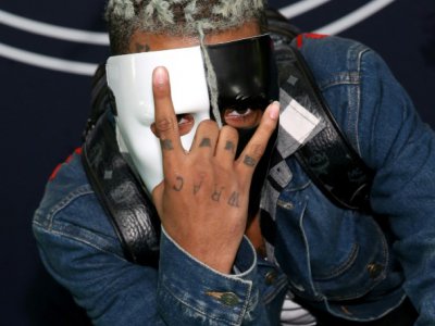 Le rappeur XXXTentacion assistant aux BET Hip Hop Awards à Miami Beach en Floride le 5 octobre 2017 - Bennett RAGLIN [GETTY IMAGES NORTH AMERICA/AFP/Archives]
