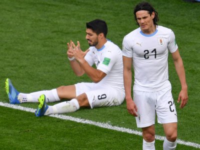 Luis Suarez et Edinson Cavani, peu inspirés contre l'Egypte à Ekaterinburg le 15 juin 2018, auront à coeur de briller pour le second match de l'Uruguay - HECTOR RETAMAL [AFP/Archives]