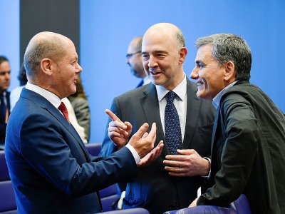Olaf Scholz, Pierre Moscovici (c) et Euclid Tsakalotos (d) lors d'une réunion de l'eurogroupe à Luxembourg, le 21 juin 2018 - JOHN THYS [AFP]