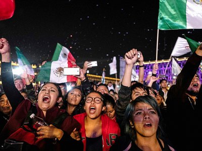 Des partisans du nouveau président mexicain élu Andres Manuel Lopez Obrador fêtent sa victoire à la présidentielle, le 1er juillet 2018 à Mexico - Guillermo Arias [AFP]