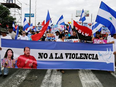 Des partisans du président Daniel Ortega manifestent contre la violence, le 7 juillet 2018 à Managua, au Nicaragua - Inti OCON [AFP]