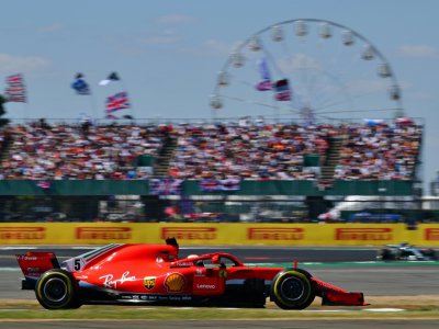 Sebastian Vettel au volant de sa Ferrari en route vers sa victoire sur le circuit anglais de Silverstone, le 8 juuillet 2018 - Andrej ISAKOVIC [AFP]