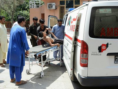 Un jeune blessé dans  l'assaut d'un site du département de l'éducation à Jalalabad (est) le 11 juillet 2018 - Noorullah SHIRZADA [AFP]