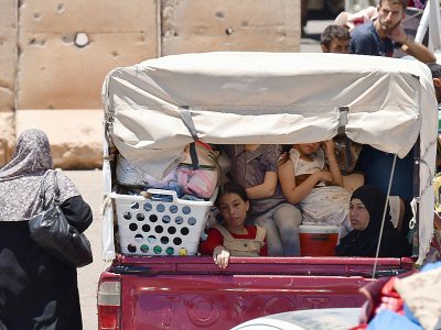 Des déplacés par l'offensive du régime dans la province méridionale de Deraa en Syrie sur le chemin du retour, le 11 juillet 2018 - Mohamad YUSUF [AFP]