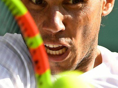 L'Espagnol Rafael Nadal face à l'Argentin Juan Martin del Potro en quarts de finale de Wimbledon, le 11 juillet 2018 - Glyn KIRK [AFP]