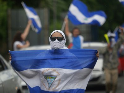 Des manifestants près de Managua, au Nicaragua, demandent le départ du président Daniel Ortega, le 15 juillet 2018 - MARVIN RECINOS [AFP]