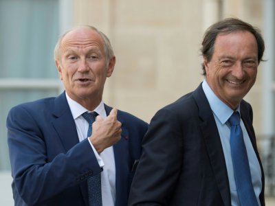 Le PDG de L'Oréal Jean-Paul Agon (à gauche) aux côtés du PDG de E. Leclerc Michel-Edouard Leclerc arrivent à l'Elysée, le 17 juillet 2018 - Eric Feferberg [AFP]