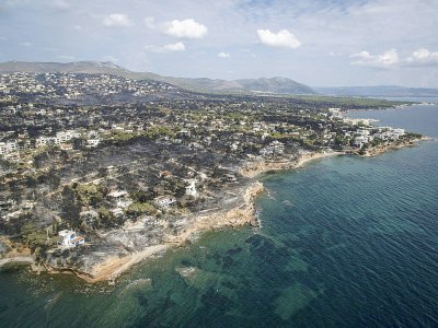 Vue aérienne de Mati, près d'Athènes, le 26 juillet 2018, ravagé par un incendie trois jours plus tôt. - SAVVAS KARMANIOLAS [AFP]